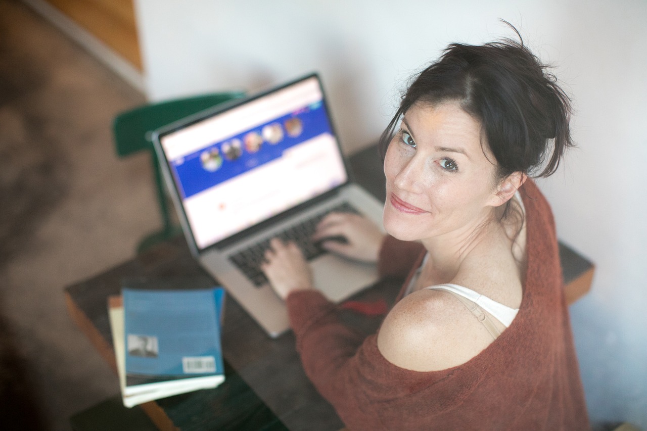 A woman using her laptop.